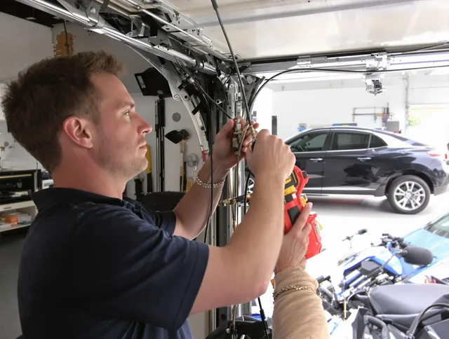 Corona Garage Door Repair safety certified technician performing cable replacement in Corona