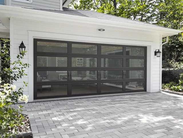 Corona Garage Door Repair design specialist presenting custom garage door options to Corona homeowner