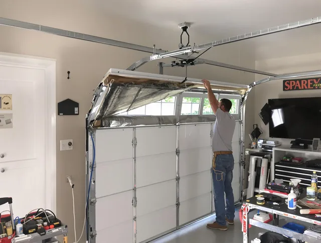 Garage door section replacement by Corona Garage Door Repair in Corona