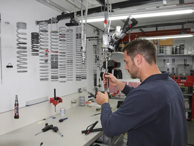 Corona Garage Door Repair safety certified technician performing precision spring replacement in Corona